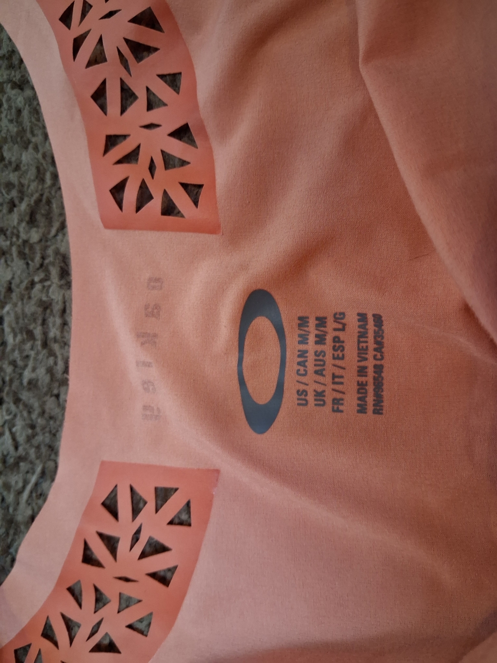 Oakley Light Coral Athletic Tank with Laser-Cut Accent - Picture 2 of 5
